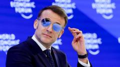 Why is Emmanuel Macron wearing sunglasses at Davos?