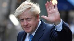 Boris Johnson leaving a private reception in London