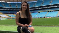 Kelen Ferreira at a football stadium