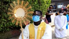 A Catholic procession through Abidjan, Ivory Coast - Sunday 22 March 2020