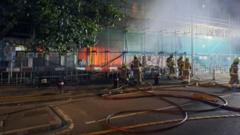 More than 225 firefighters tackle high-rise blaze