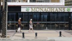 Two Scots were shot dead in a busy Spanish bar. Holidaymakers are frightened