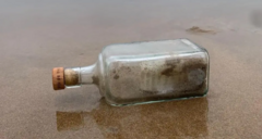Mystery of message in a bottle found on beach solved
