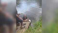 Man hailed a hero after rescuing woman from river