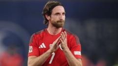 Wales and Swansea midfielder Allen retires