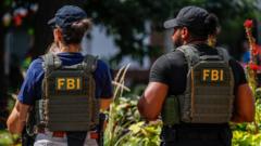 FBI fires agents pictured kneeling at George Floyd protest, US media reports