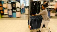 Minimum wage rises to £12.71 an hour as firms warn of impact