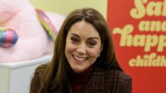 Kate meets new mothers and babies on prison visit