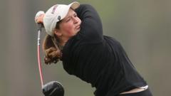 English amateur Woad starts Augusta title defence strongly