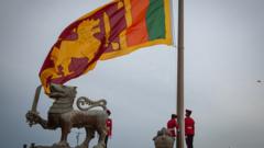 Military personnel in ceremonial uniform lowers the national flag of Sri Lanka at Galle Face Green on July 17, 2022 in Colombo, Sri Lanka.