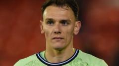 Wilshere hails 'outstanding' Naismith