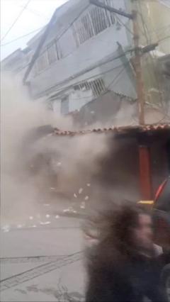 Chaos as building collapses