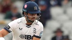 Holden century rescues Middlesex at Kent