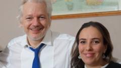 Julian Assange with his fiancee Stella Moris