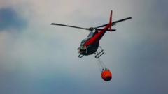 Helicopter brought in to tackle wildfire as blaze seen from space