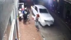 Watch: CCTV shows the moment people escaped the path of truck by inches