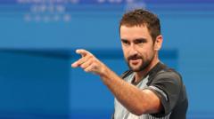 Injury-hit Cilic creates ATP history with comeback title