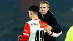 Van Persie gives son debut 'as a coach - not as a dad'