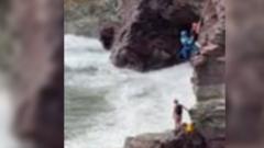 Warning after two teens rescued from rocky ledge