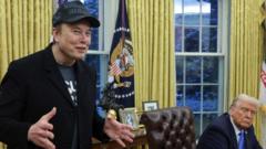 Musk defends government cuts in surprise White House appearance