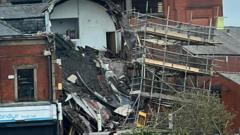 Two in hospital after building collapses in Oldham