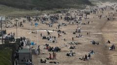 'Rowdy teens chuck our cafe tables down the beach'