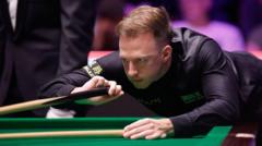 Trump sweeps Ding aside to reach UK semi-finals