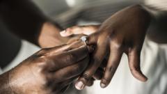 Man and woman exchange wedding ring