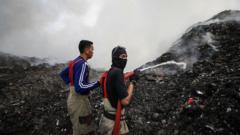 A mountain of rubbish in Indonesia has been on fire for more than a week