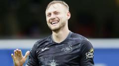 Swans eye defenders as Norwich join Darling chase