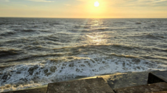 Up to 20 teenagers rescued from choppy seas