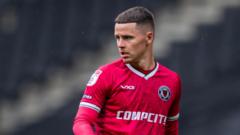Newport County re-sign midfielder Evans