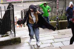 Storm Floris batters UK with winds over 80mph