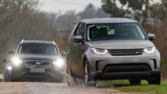 Andrew in custody as police search two addresses