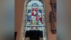 Man who broke stained glass window fined £11,000