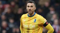 Mansfield striker Gregory announces retirement