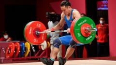 Thạch Kim Tuấn đi đấu ở nội dung cử tạ nam hạng 61 kg