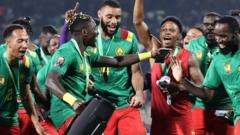 Cameroon players celebrate