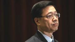 Secretary of Security John Lee Ka-Chiu talks to the media at the Legco complex on October 23, 2019 in Hong Kong, China.