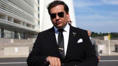 Former congressman George Santos begins seven-year prison sentence
