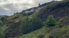 Firefighters remain at Arthur's Seat a day after blaze