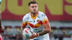 Partington returns to Wigan on five-year deal
