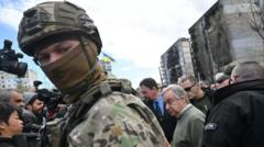 Antonio Guterres (C) visited war-ravaged Ukraine in April of last year