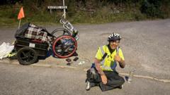 Pothole throws London man from wheelchair on charity ride