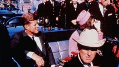 Secret Service agent who leapt onto JFK's car during assassination dies at 93