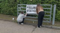 What happens at a polling station before it opens?