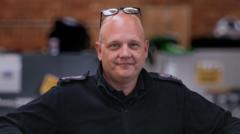 Officer who pulled driver from burning car honoured