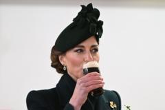 Kate drinks Guinness at St Patrick's Day event