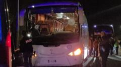 Driver dies after Italian basketball fans' bus attacked with stones