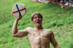YouTuber 'risks his life' for cheese-rolling win